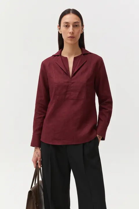 Khalis India's Sabki Maroon shirt styled with black trousers and a brown handbag