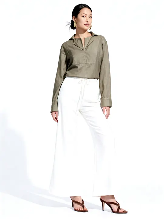 The same Khalis India Olive shirt in a finished catalogue picture, with white trousers