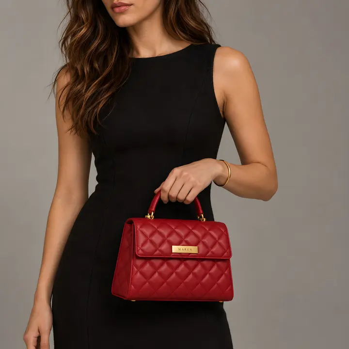 ZOYA holding a red MAREN handbag